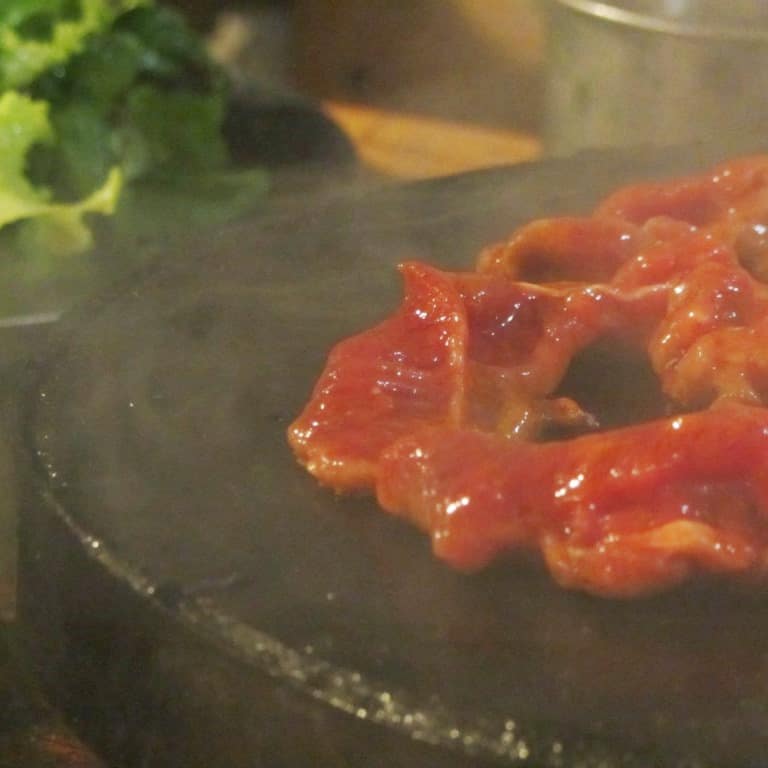 Grilling on hot rocks at Chu Quán