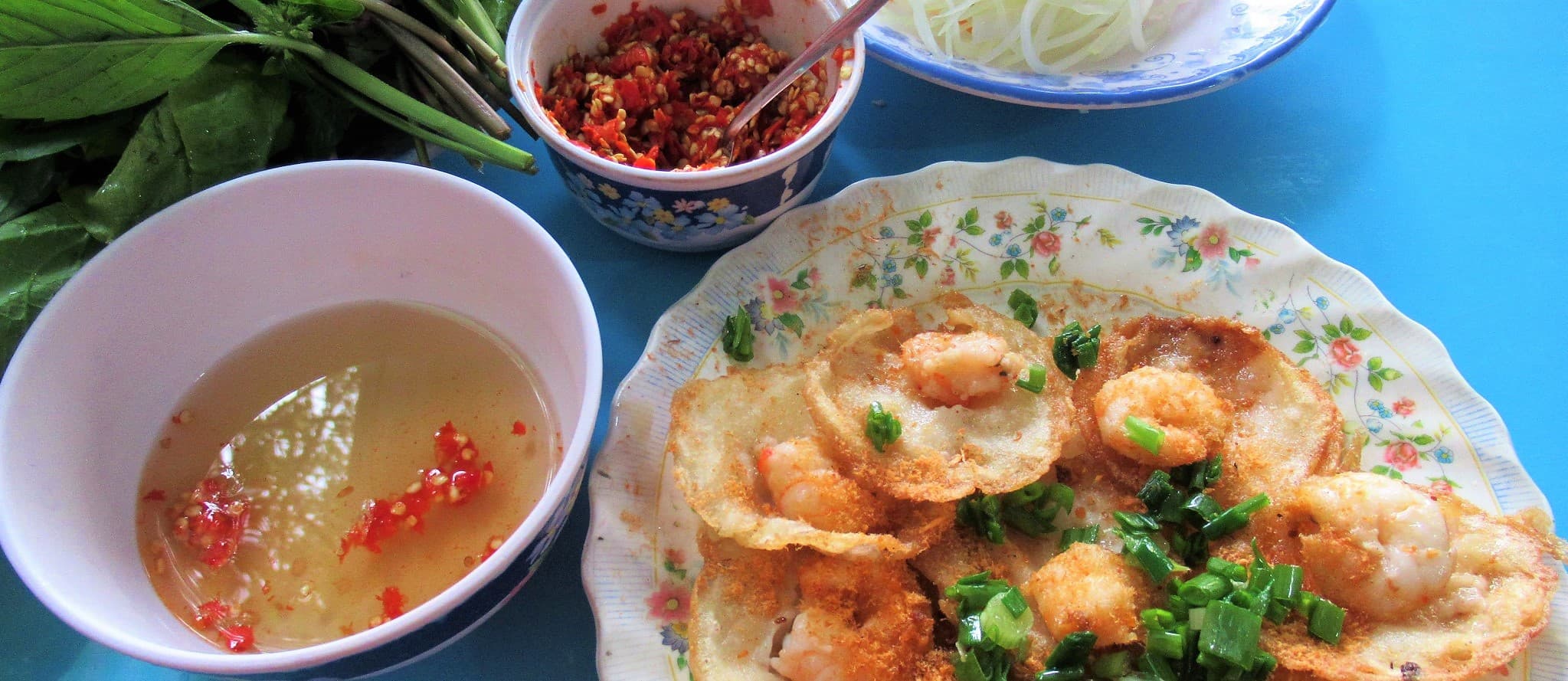 Eating bánh khọt in Vung Tau, Vietnam